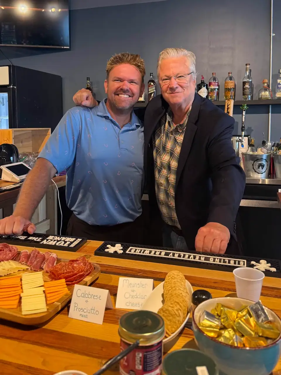 Saevar Thordarson and Brad Kozar behind the bar at The Butcher's Pantry & Restaurant