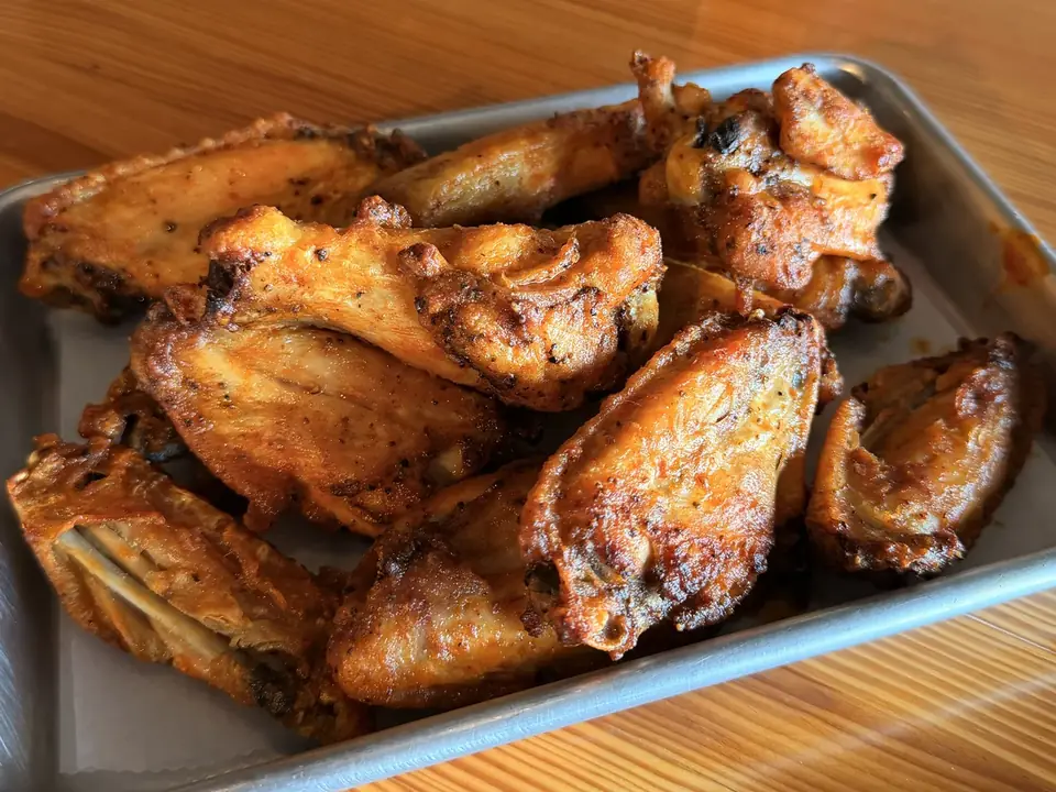 A tray of house-smoked chicken wings